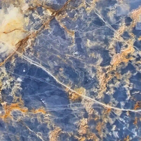 Blue Onyx natural stone with vibrant blue tones and intricate veining, ideal for backlit panels, feature walls, and luxurious countertops.
