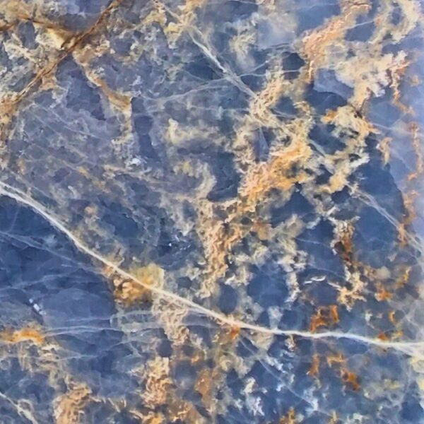 Blue Onyx natural stone with vibrant blue tones and intricate veining, ideal for backlit panels, feature walls, and luxurious countertops.