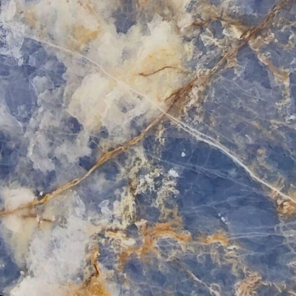 Blue Onyx natural stone with vibrant blue tones and intricate veining, ideal for backlit panels, feature walls, and luxurious countertops.