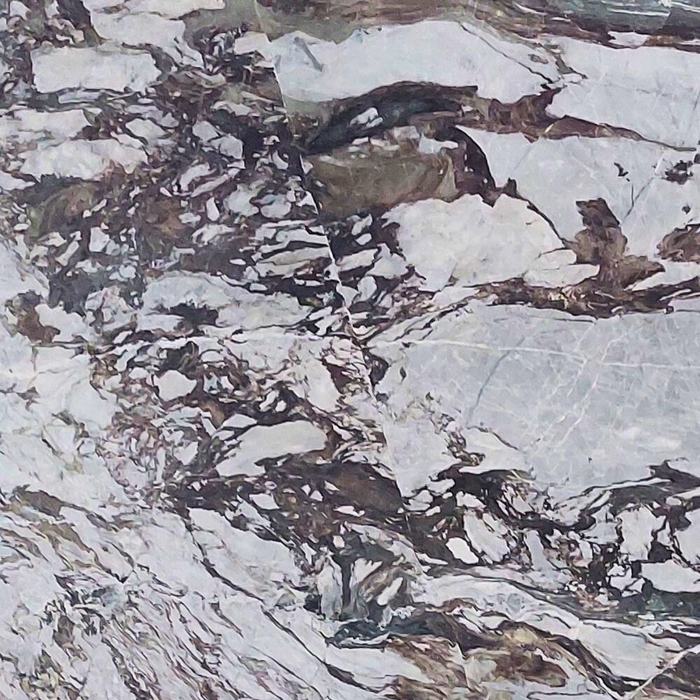 Chini Esquato natural marble with light cream tones and subtle veining, ideal for elegant flooring, wall cladding, and countertops.
