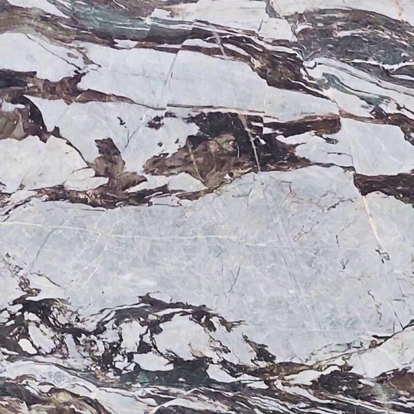 Chini Esquato natural marble with light cream tones and subtle veining, ideal for elegant flooring, wall cladding, and countertops.