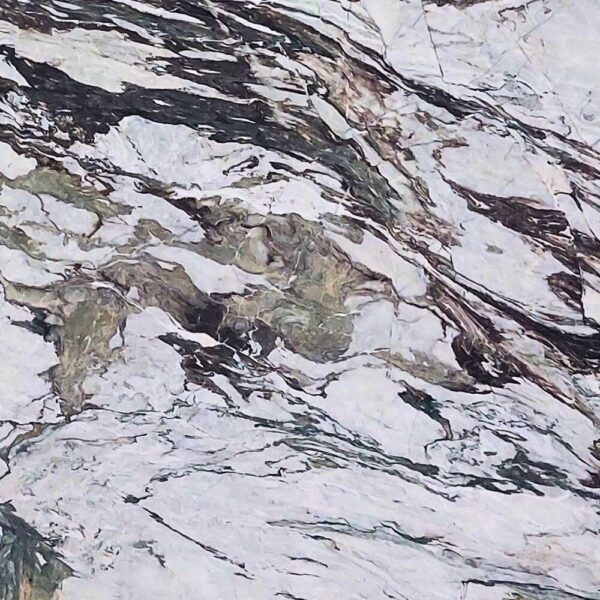 Chini Esquato natural marble with light cream tones and subtle veining, ideal for elegant flooring, wall cladding, and countertops.