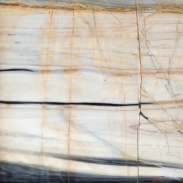 Fusion Marble natural stone with dynamic veining and bold hues, ideal for luxury flooring, countertops, and wall cladding.
