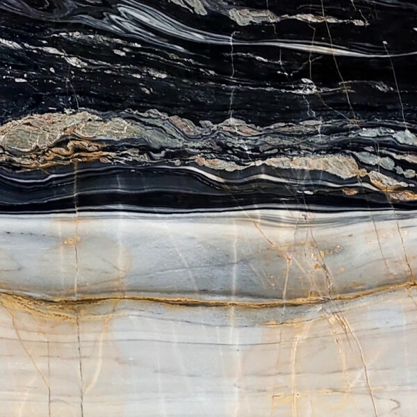 Fusion Marble natural stone with dynamic veining and bold hues, ideal for luxury flooring, countertops, and wall cladding.