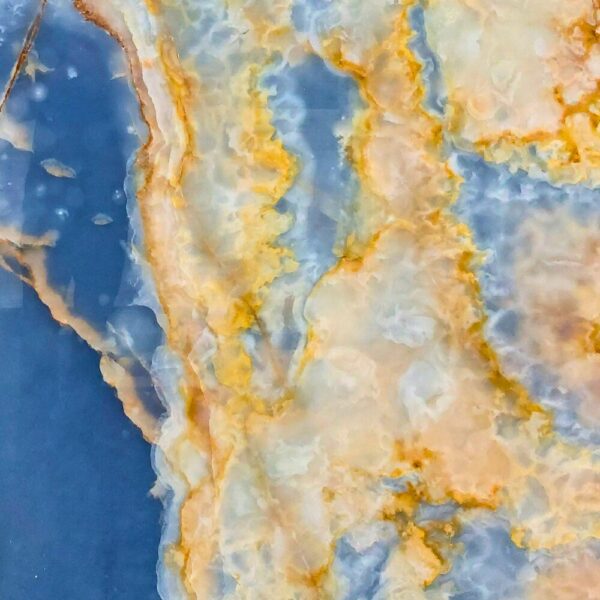 Lux Marble with white, grey, and subtle golden veining