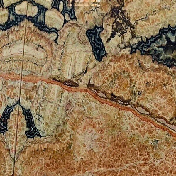 Orange Marble with vibrant orange tones and natural veining, perfect for elegant flooring, wall cladding, and countertops.