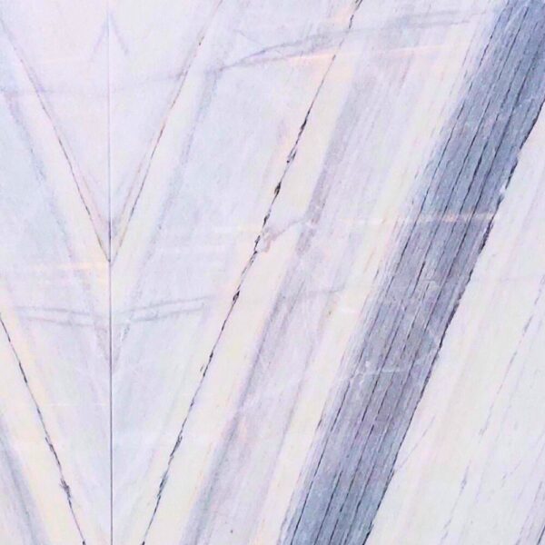 Saiman Crystal quartzite with a white background and elegant gray and black veining, perfect for luxurious interior and exterior applications.