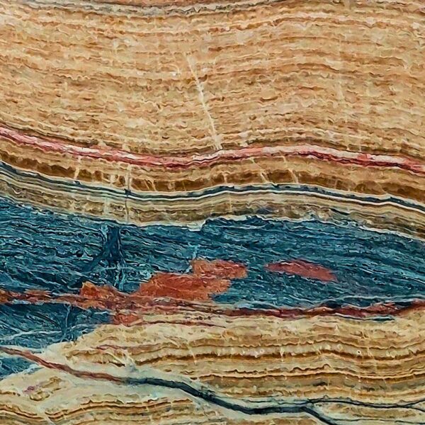 Travertine Seven Color natural stone with a blend of red, beige, brown, gray, and gold tones, perfect for flooring, wall cladding, and outdoor applications.