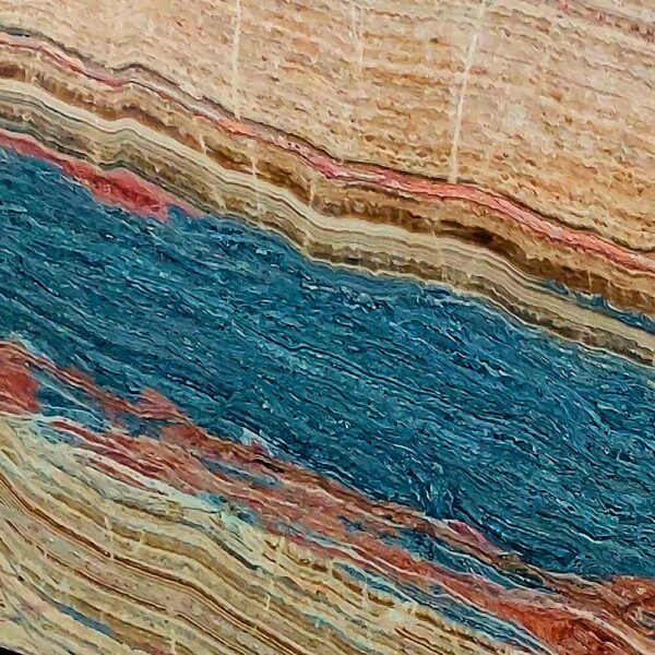 Travertine Seven Color natural stone with a blend of red, beige, brown, gray, and gold tones, perfect for flooring, wall cladding, and outdoor applications.