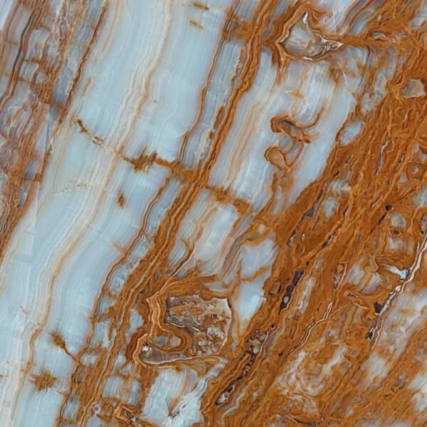 Tree Onyx natural stone with earthy tones and organic veining patterns, ideal for backlit panels, feature walls, and decorative applications.